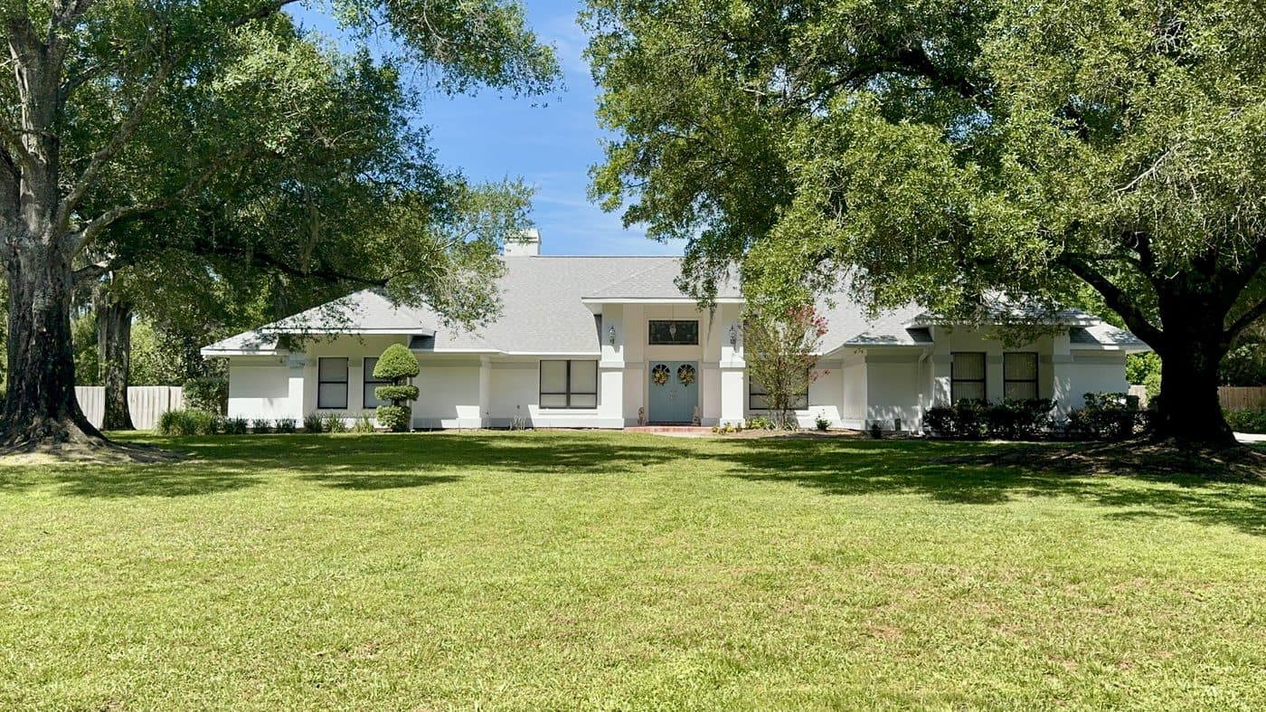 Bloomingdale Valrico FL modern white ranch estate home representing the August 2026 real estate market